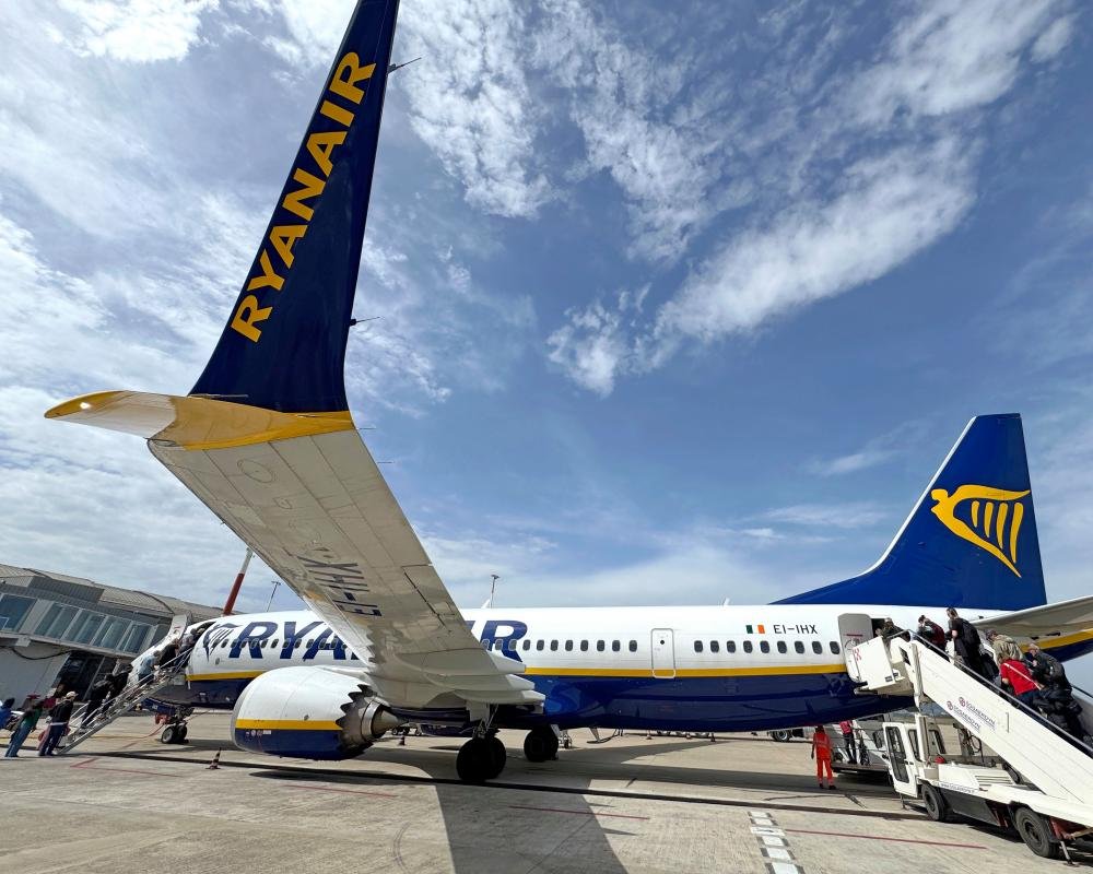 ryanair plane taking off, eu fine for anti-competitive behaviour