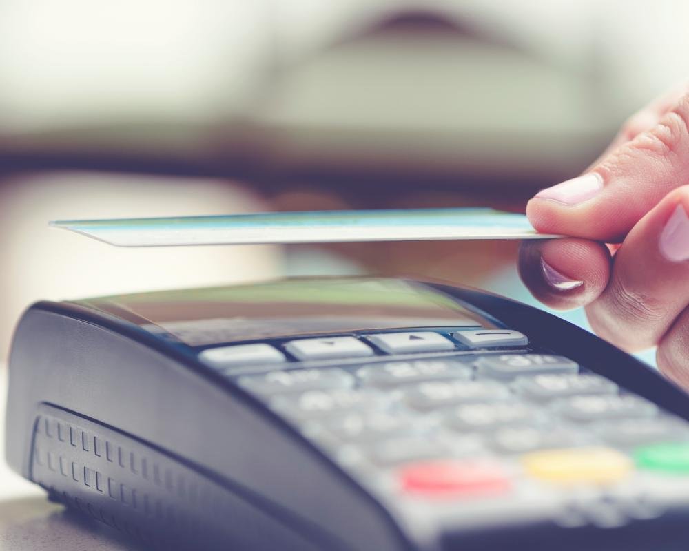 contactless payment card being used