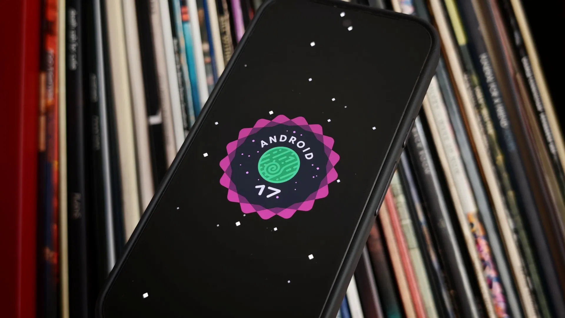 Pixel phone screen showing Android 17 QPR1 update notification with glitchy UI elements